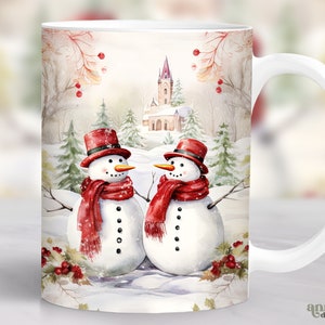 May include: White ceramic mug with a winter scene featuring two snowmen wearing red scarves and hats. The background includes a church, trees, and snow.
