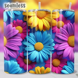 Puede incluir: Patr&oacute;n sin costuras de flores de margarita de colores sobre un fondo azul. Las flores son en tonos de rosa, morado, azul y amarillo. Este dise&ntilde;o es perfecto para un vaso o otros proyectos de sublimaci&oacute;n.