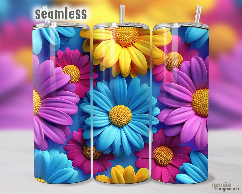 Puede incluir: Patr&oacute;n sin costuras de flores de margarita de colores sobre un fondo azul. Las flores son en tonos de rosa, morado, azul y amarillo. Este dise&ntilde;o es perfecto para un vaso o otros proyectos de sublimaci&oacute;n.