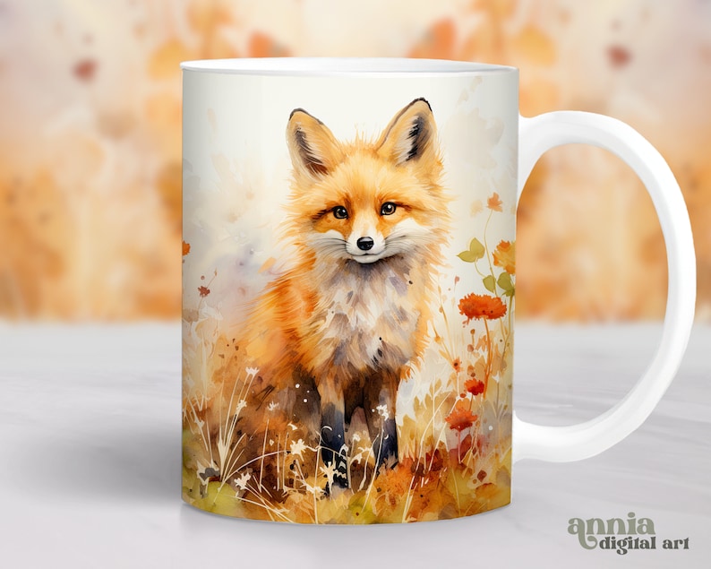 May include: White ceramic mug featuring a watercolour illustration of a red fox standing in a field of orange wildflowers. The fox is looking directly at the viewer.