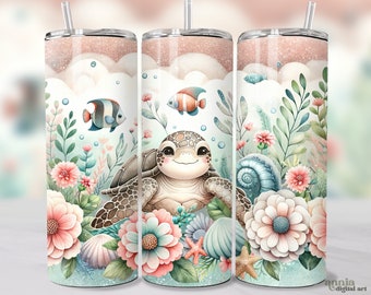 May include: A white tumbler with a pink glitter lid and a straw. The tumbler features a watercolor illustration of a sea turtle surrounded by pink and green flowers, seashells, and starfish. There are also two fish swimming in the background.