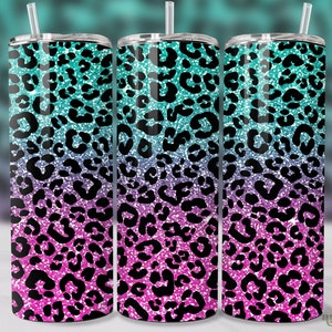 May include: Three stainless steel tumblers with a gradient glitter leopard print design. The print features shades of teal, purple, and pink.