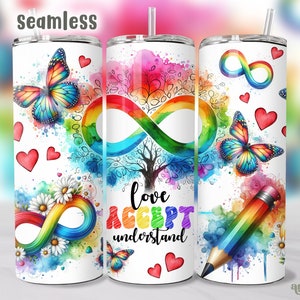 May include: A white tumbler with a rainbow infinity symbol, butterflies, hearts, and the words "love accept understand".