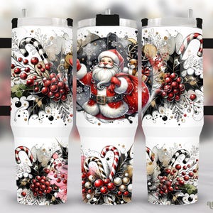 May include: A white stainless steel tumbler with a black handle and lid. The tumbler features a Christmas-themed design with Santa Claus, holly, berries, and candy canes.