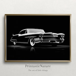 May include: A black and white silhouette of a classic car against a black background. The car is a 1950s Cadillac with a long hood and large tailfins. The car is in sharp focus, while the background is blurred.