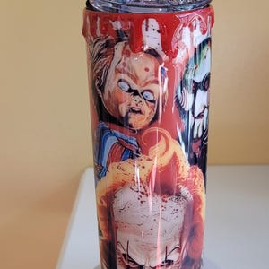 Horror themed 20 oz straight tumbler.  Including handmade horror topper.