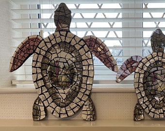 Family of turtles mosaics using vintage crockery. Indoors or outdoors.