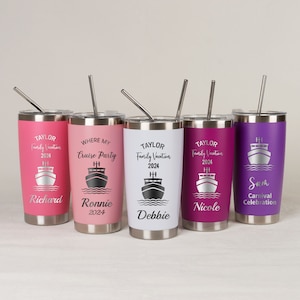 May include: Five stainless steel tumblers with personalized text and a cruise ship graphic. The tumblers are in various colors, including pink, white, purple, and a dark purple. Each tumbler has a straw.