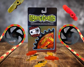 Cubrecadenas de bicicleta rojos y dorados – Tapas de cadena a presión – Aptas para bicicletas de niños, adultos, BMX, cruisers y eléctricas - Accesorio para bicicletas