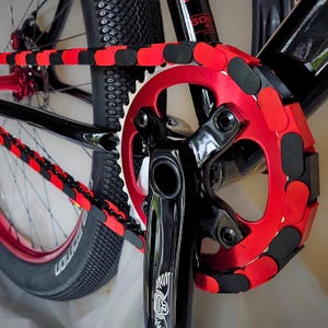 Red and Black Bike Chain Caps – Snap-On BMX, Cruiser, Kids and E-Bike Accessory