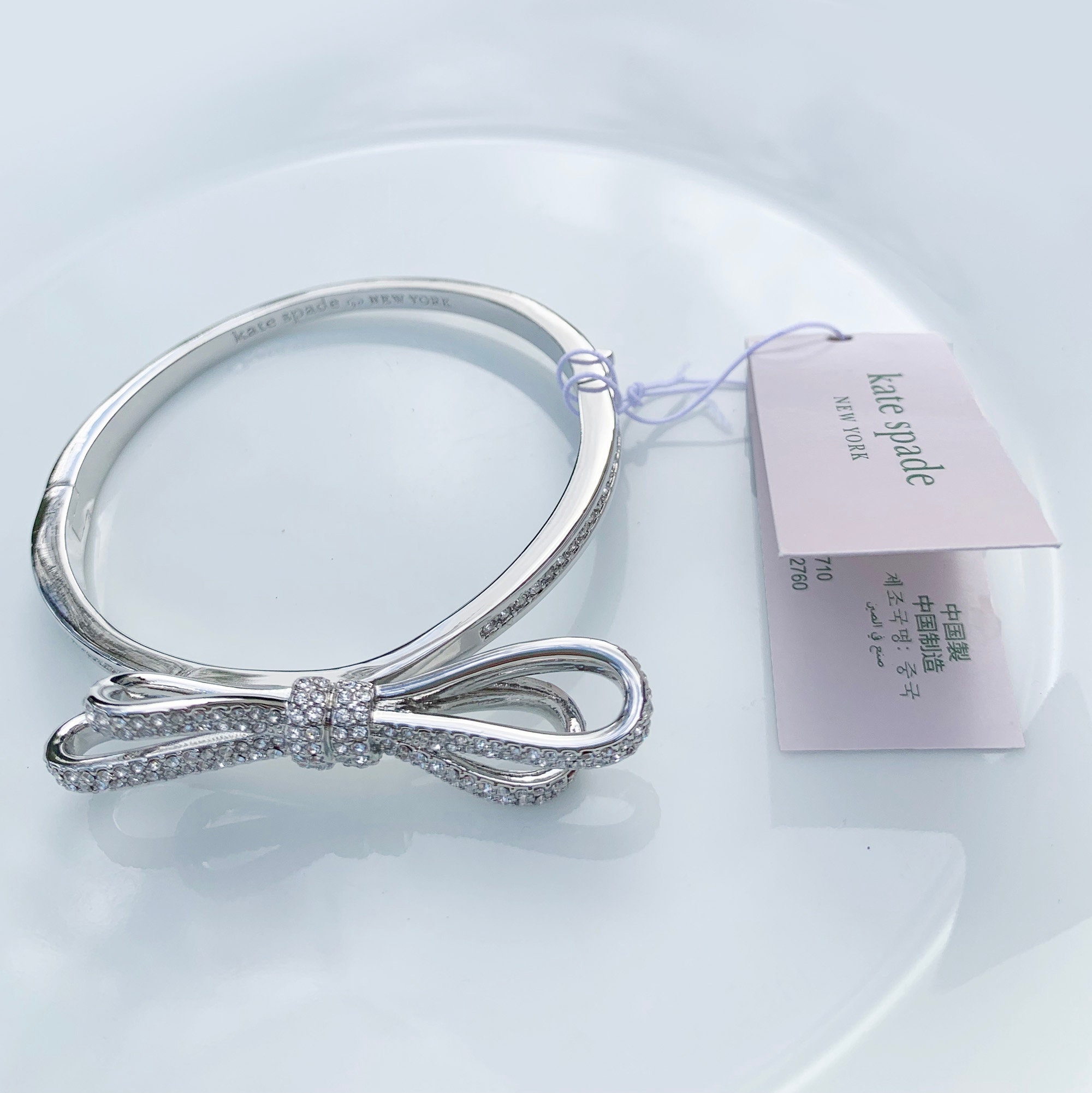 Kate spade silver bow on sale bracelet