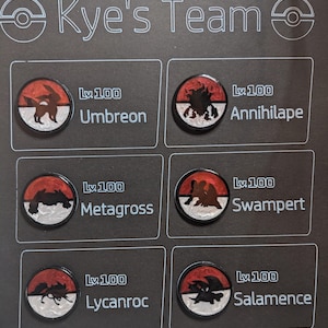 May include: Six red and white Pokemon character tokens with black silhouettes. Each token has a level 100 label and the name of the Pokemon: Umbreon, Annihilape, Metagross, Swampert, Lycanroc, and Salamence.