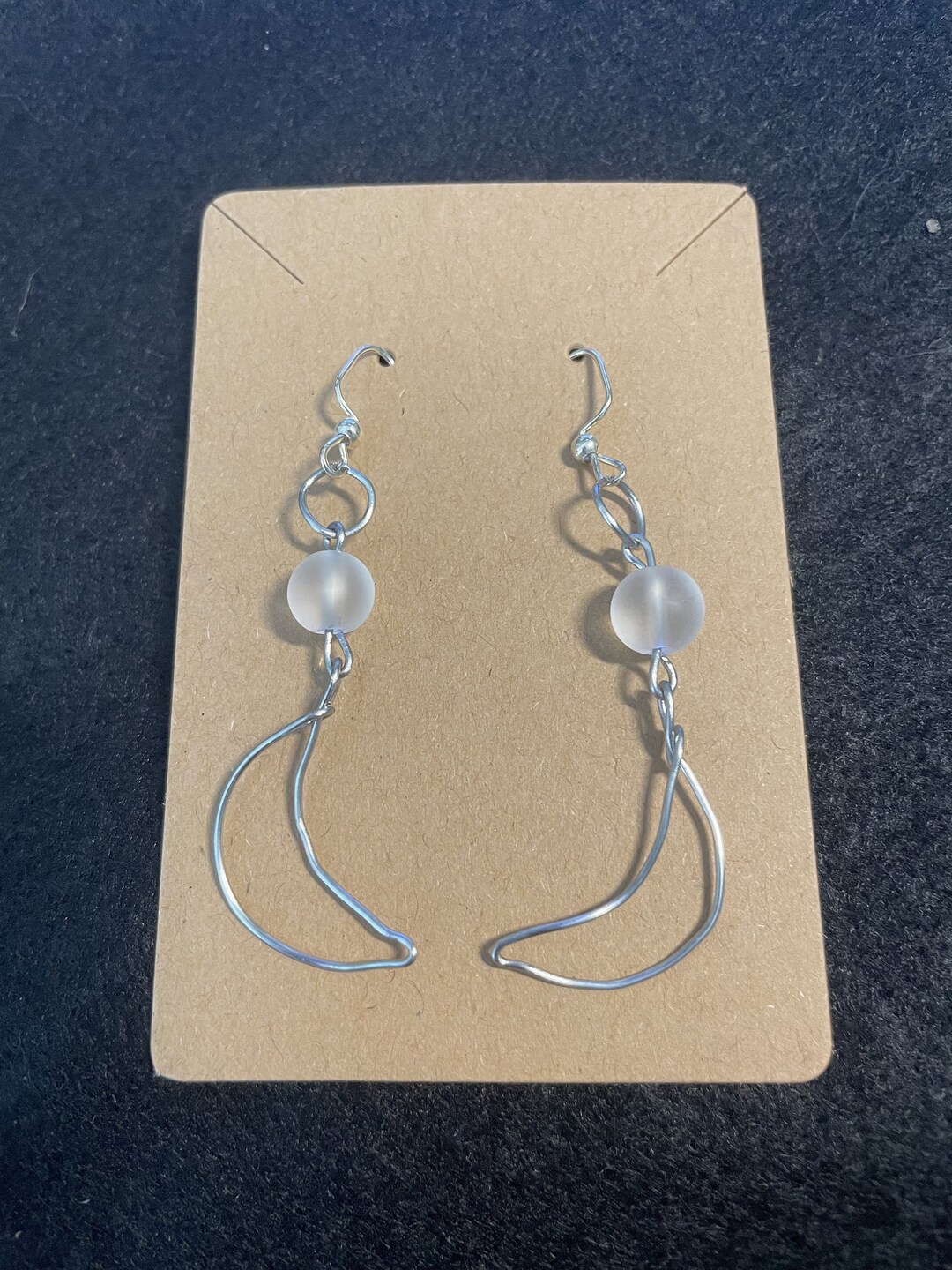 Crescens Tragicom Moon Earrings