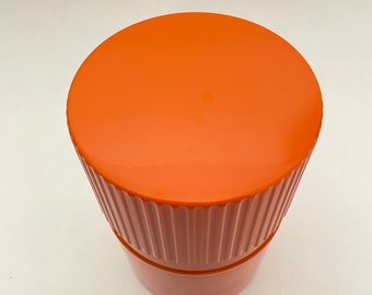 IRA.  Orange Melamine Canister