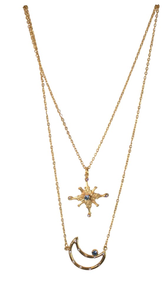 Golden Crescent Man and a Starburst Necklace Golden Crescent Man and a Starburst Necklace