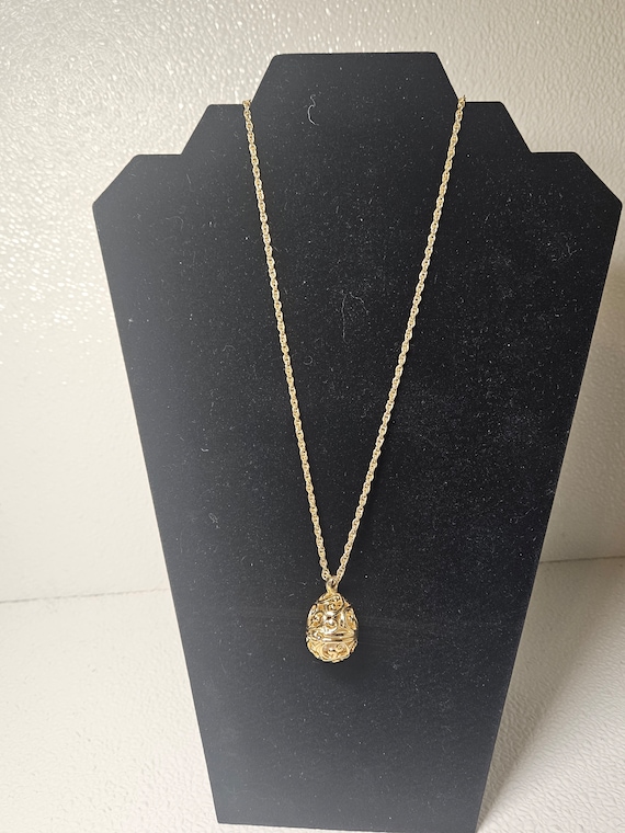 Joan Rivers gold Fabergé egg pendant necklace - image 1