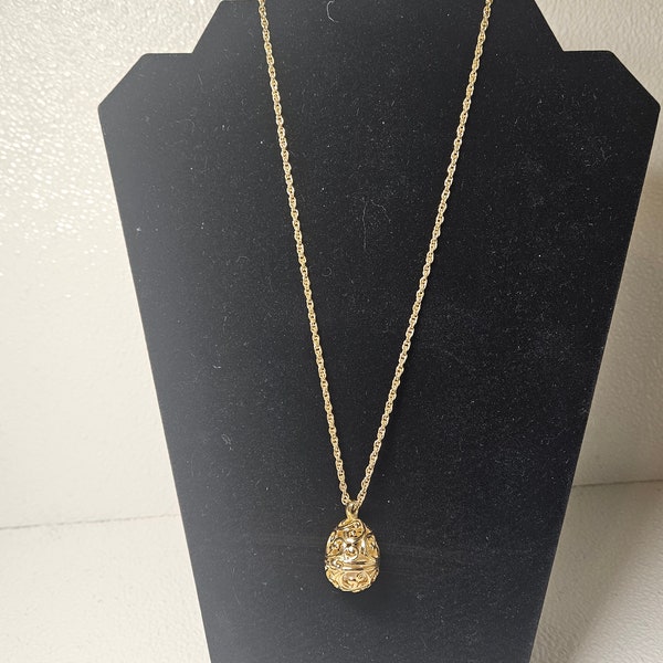 Joan Rivers gold Fabergé egg pendant necklace