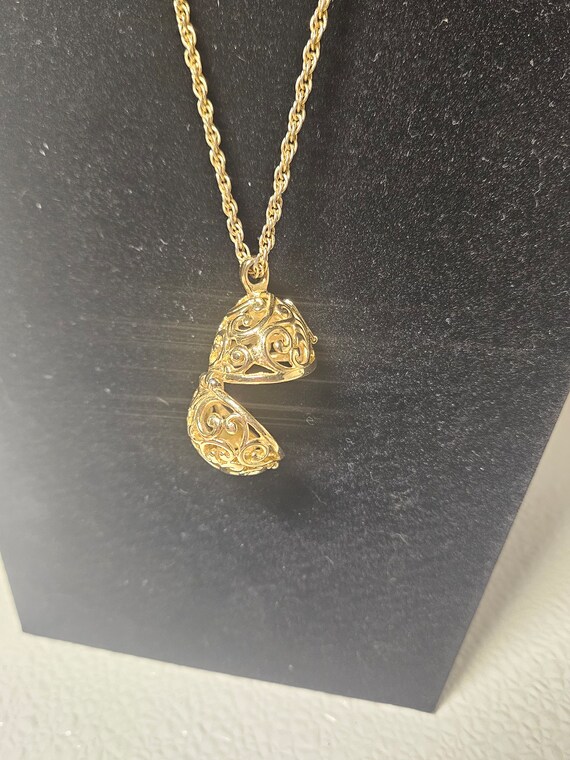 Joan Rivers gold Fabergé egg pendant necklace - image 4