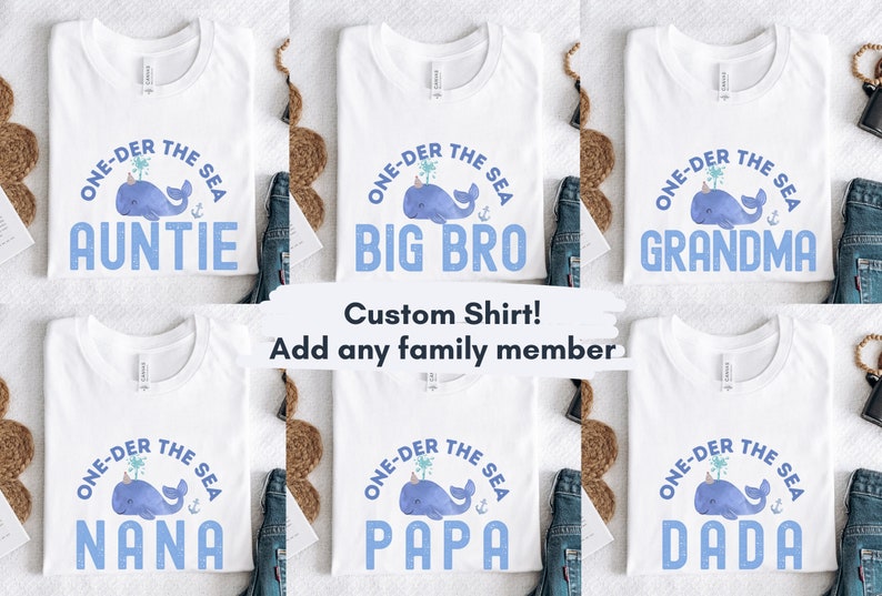 May include: Six white t-shirts with a blue whale graphic and the text "One-der the Sea" with a different family member title on each shirt: Auntie, Big Bro, Grandma, Nana, Papa, and Dada.