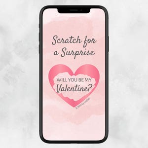 Puede incluir: Un smartphone muestra un gráfico temático del Día de San Valentín. La pantalla presenta el texto "Scratch for a Surprise" sobre un corazón rosa con "Will You Be My Valentine?" y "Scratch Here". El fondo es un lavado de acuarela.