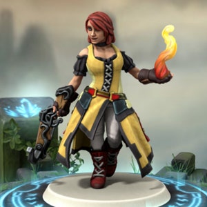 May include: A female figurine with red hair, wearing a yellow and black outfit, holding a fiery orange orb in one hand and a gun in the other. She is standing on a circular base.