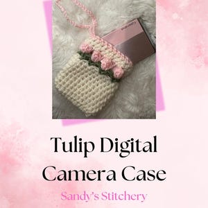 May include: A crocheted camera case with a tulip design in pink and green. The case has a white background and a pink strap. The text "Tulip Digital Camera Case" and "Sandy's Stitchery" is visible below the image.