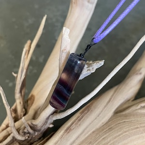 cylinder fluorite Necklace pendant on purple string