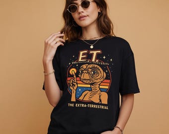E.T. Unisex Softstyle T-Shirt: Retro Alien Movie Graphic Tee for Sci-Fi Fans