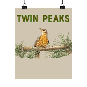 May include: A poster with the text "TWIN PEAKS" in green and brown lettering. It features a detailed illustration of a bird perched on a branch with green pine needles, set against a beige background.
