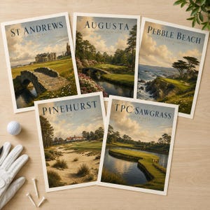 May include: Five rectangular art prints featuring illustrations of famous golf courses: St Andrews, Augusta National, Pebble Beach, Pinehurst No. 2, and TPC Sawgrass. A white golf ball and a white golf glove are positioned near the prints.