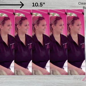 May include: A clear acetate backing holds five vertical images of a woman in a dark purple polo shirt. The images are 8 inches by 10.5 inches. The woman is smiling and wearing a headband and sunglasses.