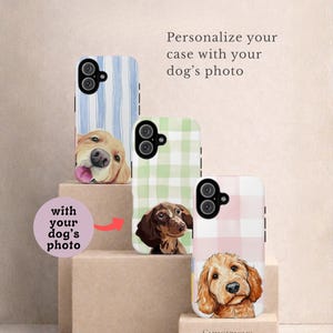 May include: Three phone cases with dog portraits. The cases feature a golden retriever, a dachshund, and a goldendoodle. The cases have different patterns: blue stripes, green gingham, and pink gingham. Text reads: "Personalize your case with your dog's photo."