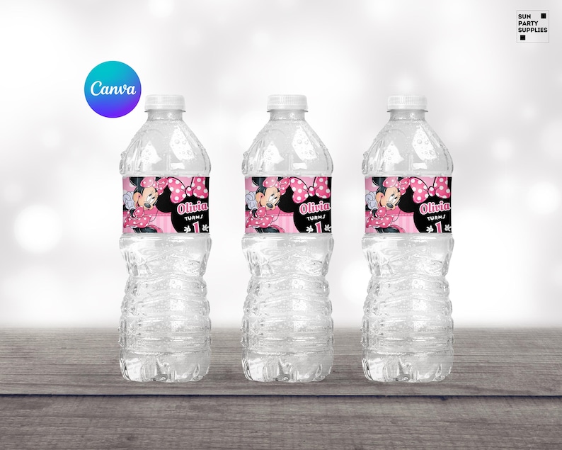 May include: Three clear plastic water bottles with personalized labels featuring a cartoon image of Minnie Mouse with a pink bow. The labels also include the text "Olivia Turns 1".