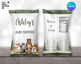 May include: A white chip bag with a green border. The front of the bag features a woodland scene with a deer, raccoon, bear, and fox. The text "Ashley's Baby Shower" is printed on the bag. The back of the bag has the text "Thank you for coming" and a nutrition facts label.