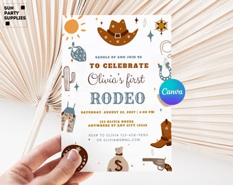 May include: A white invitation with a cowboy theme. The invitation says "Saddle up and join us to celebrate Olivia's first Rodeo". The invitation also includes a date and time, address, and RSVP information.