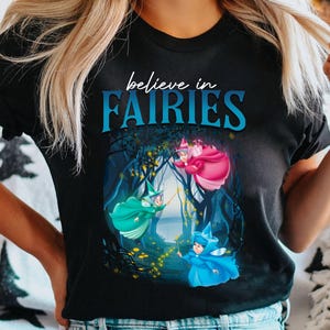 Flora Fauna And Merryweather Believe In Fairies Shirt, Disney Sleeping Beauty Fairy Godmother T-shirt, Disneyland Family Trip, Magic Kingdom
