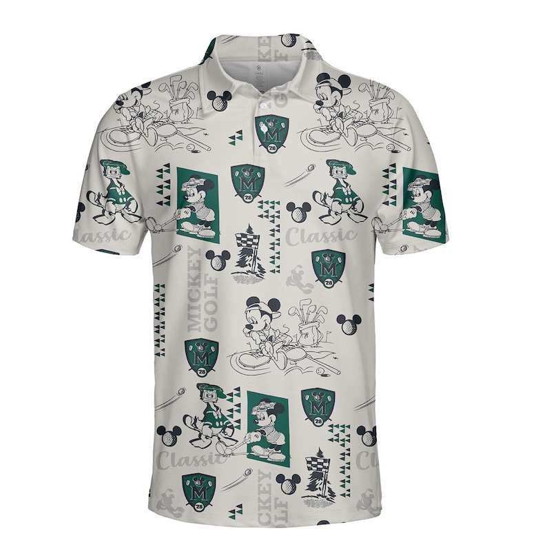 May include: Cream polo shirt with a repeating pattern of Mickey Mouse playing golf. The design includes golf-related graphics, the words "Mickey Golf Classic," and a shield emblem. The shirt has a collared neckline and short sleeves.