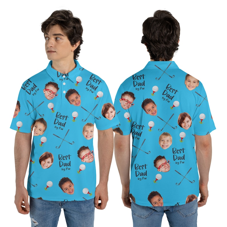 May include: A light blue polo shirt with a repeating pattern of golf balls, golf clubs, and children's faces. The text "Best Dad by Par" is also printed on the shirt.