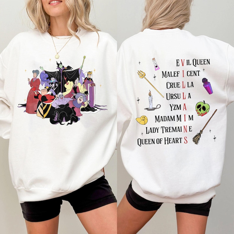 May include: White sweatshirt with a graphic of Disney villains on the front and a list of Disney villains on the back. The villains include Maleficent, Cruella de Vil, Ursula, Yzma, Madam Mim, Lady Tremaine, and the Queen of Hearts.