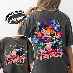 May include: Dark grey t-shirt with a vibrant graphic of Mickey Mouse in a sorcerer's hat, the text "Fantasmic!" and "Hollywood". The back of the shirt features various Disney characters.