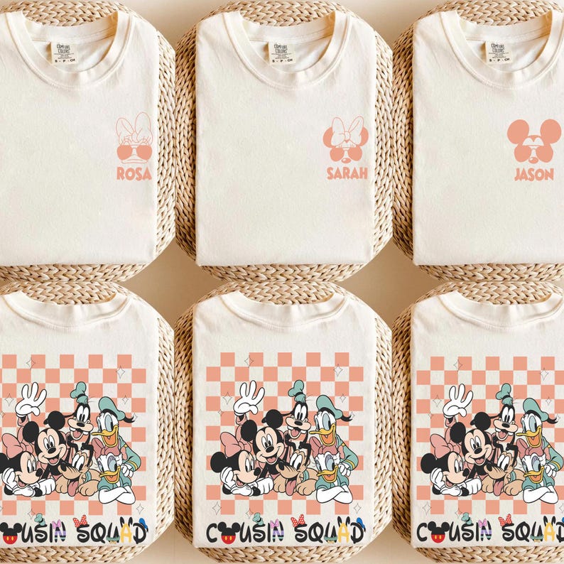 May include: Six cream-coloured t-shirts. The top row features shirts with character graphics and names: Rosa, Sarah, and Jason. The bottom row has shirts with a graphic of Mickey Mouse, Minnie Mouse, Donald Duck, and Goofy, with the text "Cousin Squad".