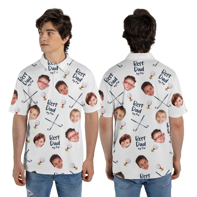 May include: White polo shirt with a repeating pattern of children's faces, golf clubs, golf balls, and the text "Best Dad by Par." The shirt has a collared neckline and short sleeves.