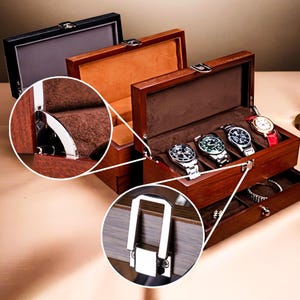 May include: A wooden watch box with a brown interior and a hinged lid. The box has a drawer and is designed to hold multiple watches. The box has a silver latch and is made of dark wood.