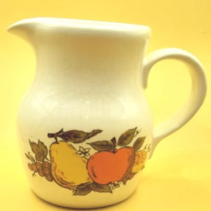 Retro 70s cream-coloured kitchen ceramic jug with design of pear, apple, grape, orange
