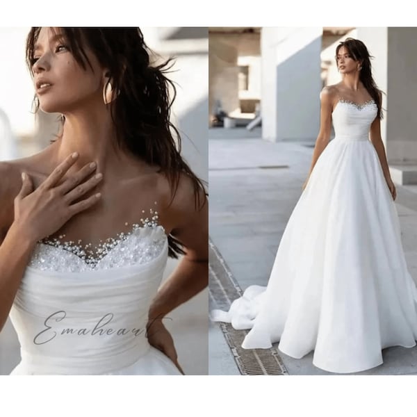 Enchanting Elegance Sleeveless A-Line Boho Wedding Dress With Sweetheart Neckline And Floor-Length Sweep Train