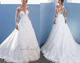 Exquisite Long Sleeve Wedding Dress Sheer Neck A-Line Appliqued Bridal Gown With Covered Buttons And Chapel Train