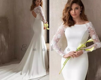 Elegant Lace Long Sleeve Mermaid Wedding Dress with Boat Neck Open Back and Satin Buttons Bridal Gown for Women with a Stunning Sweep Train