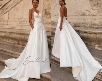 Elegant Sweetheart-Neck A-Line Wedding Dress With Spaghetti Straps, Open Back, And Sweep Train For The Modern Bride