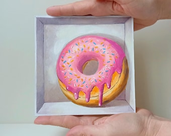 ドーナツの絵画のトレンディな壁アート、新聞紙に描かれたピンクの