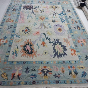 Hand Knotted Turkish Oushak Wool Rug: Traditional Pastel Floral Design